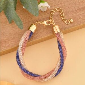 Multi Color Australian Crystal Twisted Triple Row Bracelet in Goldtone